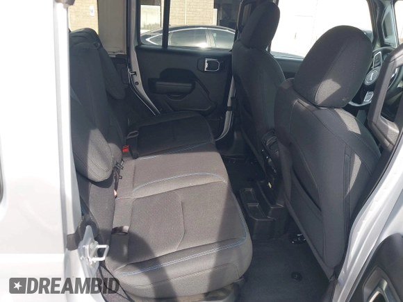 2023 Jeep Wrangler Rubicon with VIN 1C4JJXR69PW581474, listed as a IAAI auction lot 41697016 with 25,775 mi miles and . Bid and sale history available at DreamBid. Image 8.
