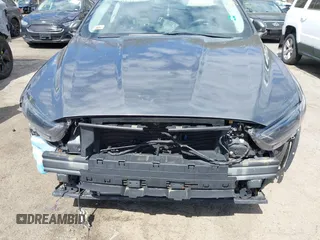 2015 Ford Fusion Titanium with VIN 3FA6P0K96FR283763, listed as a IAAI auction lot 42046868 with 104,542 mi miles. Bid and sale history available at carsss.com. Image 6.