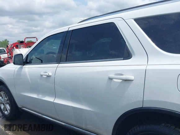2013 Dodge Durango SXT z VIN 1C4RDHAG9DC530204, wystawiony jako IAAI lot #42128529 z przebiegiem 233 539 mil mil oraz . Historia ofert i sprzedaży dostępna na DreamBid. Obrazek 14.