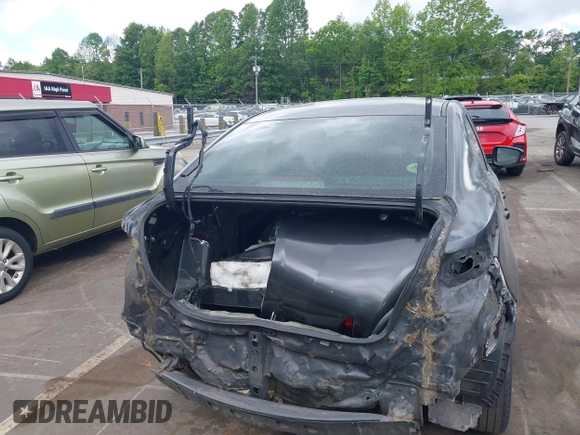 2016 Scion iA z VIN 3MYDLBZV5GY133972, wystawiony jako IAAI lot #42260164 z przebiegiem 156 981 mil mil oraz . Historia ofert i sprzedaży dostępna na DreamBid. Obrazek 17.
