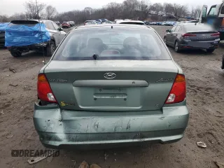 2003 Hyundai Accent GL with VIN KMHCG35C43U236043, listed as a Copart auction lot 87675835 with 76,232 mi miles and Salvage Title. Bid and sale history available at carsss.com. Image 6.