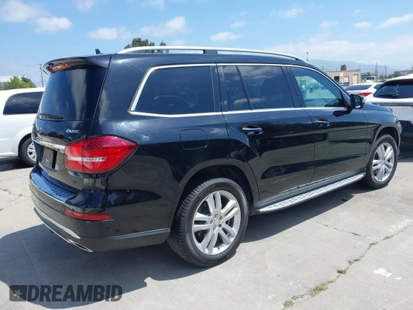 2017 Mercedes-Benz GLS 450 with VIN 4JGDF6EE9HA873951, listed as a IAAI auction lot 42053519 with 96,840 mi miles and . Bid and sale history available at DreamBid. Image 4.