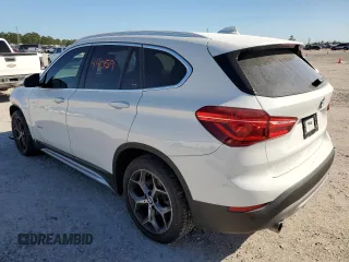 2018 BMW X1 xDrive28i with VIN WBXHT3C39J5K26126, listed as a Copart auction lot 65973652 with 44,059 mi miles. Bid and sale history available at carsss.com. Image 3.