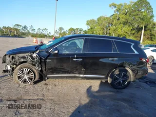 2019 Infiniti QX60 LUXE with VIN 5N1DL0MN0KC548592, listed as a IAAI auction lot 41305876 with 142,064 mi miles. Bid and sale history available at carsss.com. Image 14.