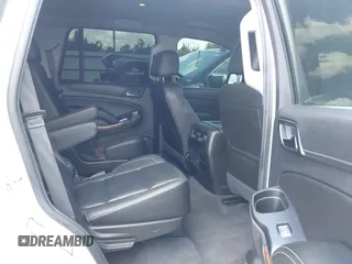 2020 Chevrolet Tahoe LTZ with VIN 1GNSCCKCXLR215899, listed as a IAAI auction lot 40128171 with 109,541 mi miles and . Bid and sale history available at DreamBid. Image 8.