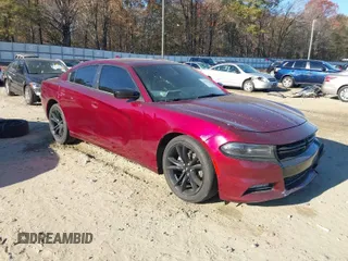 2018 Dodge Charger SXT Plus with VIN 2C3CDXHG2JH284485, listed as a IAAI auction lot 41029148 with 124,193 mi miles and . Bid and sale history available at carsss.com. Image 1.