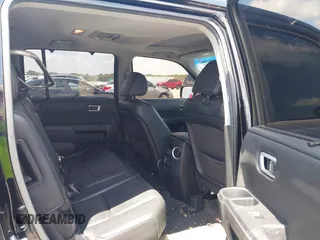 2013 Honda Pilot Touring z VIN 5FNYF3H98DB023104, wystawiony jako IAAI lot #42310538 z przebiegiem 169 385 mil mil oraz . Historia ofert i sprzedaży dostępna na DreamBid. Obrazek 8.