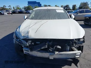 2021 Nissan Altima SV with VIN 1N4BL4DV8MN310134, listed as a IAAI auction lot 42418448 with 96,140 mi miles and . Bid and sale history available at DreamBid. Image 6.