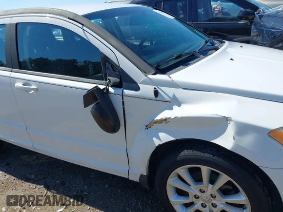 2011 Dodge Caliber Heat with VIN 1B3CB5HA6BD179014, listed as a IAAI auction lot 41704508 with 188,127 mi miles and . Bid and sale history available at DreamBid. Image 6.