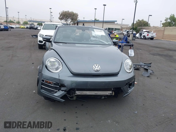 2018 Volkswagen Beetle S z VIN 3VW5DAAT3JM506023, wystawiony jako IAAI lot #42414886 z przebiegiem 33 424 mil mil oraz . Historia ofert i sprzedaży dostępna na DreamBid. Obrazek 13.