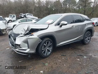 2021 Lexus RX with VIN 2T2HZMDA0MC289343, listed as a IAAI auction lot 41556887 with 42,273 mi miles. Bid and sale history available at carsss.com. Image 2.
