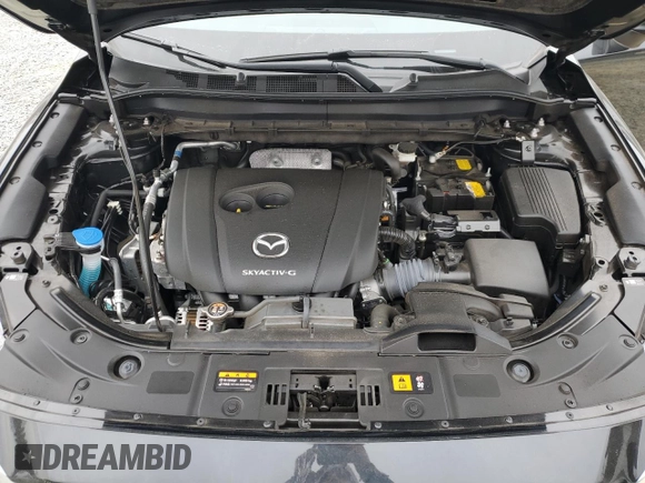 2024 Mazda CX-5 S Carbon Edition z VIN JM3KFBCLXR0496504, wystawiony jako Copart lot #48319375 z przebiegiem 19 041 mil mil oraz Szkody całkowita. Historia ofert i sprzedaży dostępna na DreamBid. Obrazek 12.