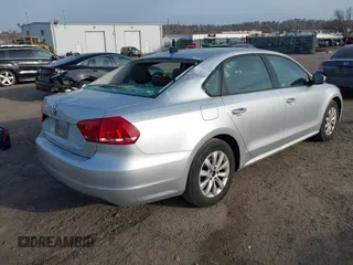 2014 Volkswagen Passat S w/Nav with VIN 1VWAP7A39EC016279, listed as a IAAI auction lot 41792113 with 189,833 mi miles. Bid and sale history available at carsss.com. Image 4.
