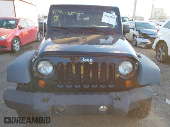 2011 Jeep Wrangler Rubicon with VIN 1J4HA6D11BL564211, listed as a IAAI auction lot 41242240 with 124,039 mi miles and . Bid and sale history available at carsss.com. Image 12.