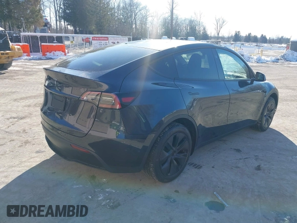2025 Tesla Model Y Long Range with VIN 7SAYGDED0SF256230, listed as a IAAI auction lot 41356520 with 262 mi miles and . Bid and sale history available at DreamBid. Image 4.