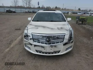 2013 Cadillac XTS Platinum z VIN 2G61V5S38D9204439, wystawiony jako Copart lot #53886495 z przebiegiem 89 940 mil mil oraz Szkody całkowita. Historia ofert i sprzedaży dostępna na DreamBid. Obrazek 5.