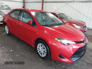 2018 Toyota Corolla L z VIN 2T1BURHE4JC051221, wystawiony jako IAAI lot #42378579 z przebiegiem 69 213 mil mil oraz . Historia ofert i sprzedaży dostępna na DreamBid. Obrazek 1.