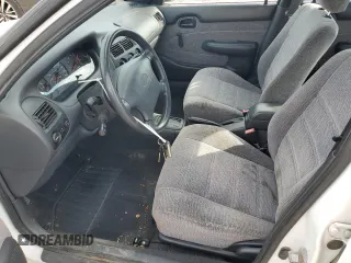 1996 Geo Prizm z VIN 1Y1SK5261TZ028032, wystawiony jako Copart lot #77434654 z przebiegiem 54 665 mil mil oraz Tytuł czysty. Historia ofert i sprzedaży dostępna na DreamBid. Obrazek 7.
