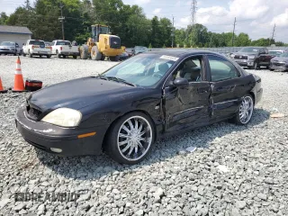 2002 Mercury Sable LS Premium with VIN 1MEHM55S02A621328, listed as a Copart auction lot 59556805 with 183,594 mi miles and Salvage title. Bid and sale history available at DreamBid. Image 1.