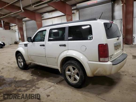 2010 Dodge Nitro SXT z VIN 1D4PT5GK8AW158064, wystawiony jako Copart lot #84274974 z przebiegiem 202 668 mil mil oraz Czysty tytuł • Clean title. Historia ofert i sprzedaży dostępna na DreamBid. Obrazek 2.