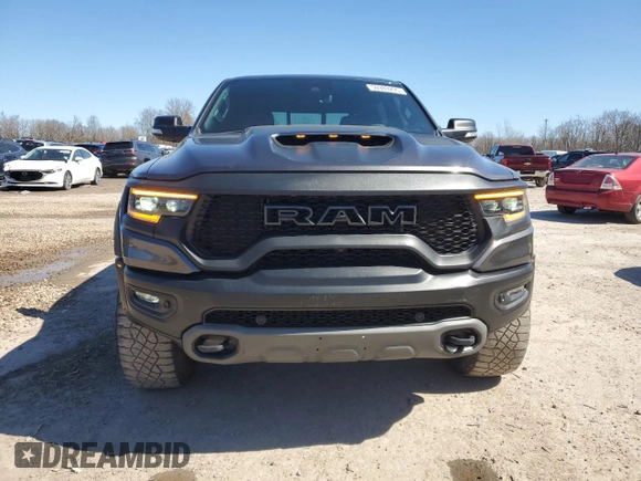 2021 Ram 1500 с VIN NCS107300, выставлен на аукционе Copart как лот 50989205 с пробегом 25 121 миль миль и Списание • Salvage title. История ставок и продаж доступна на DreamBid. Изображение 5.