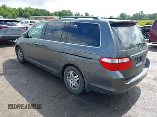 2007 Honda Odyssey EX z VIN 5FNRL38477B406473, wystawiony jako IAAI lot #42364081 z przebiegiem 214 511 mil mil oraz . Historia ofert i sprzedaży dostępna na DreamBid. Obrazek 3.