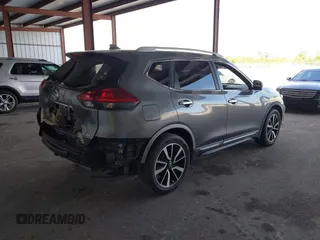 2018 Nissan Rogue SV with VIN JN8AT2MT9JW485804, listed as a IAAI auction lot 41711723 with 74,860 mi miles and . Bid and sale history available at carsss.com. Image 4.