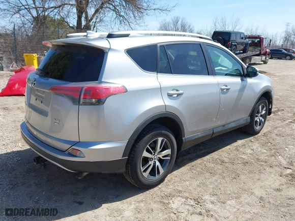 2017 Toyota RAV4 XLE with VIN 2T3RFREV1HW561295, listed as a IAAI auction lot 42049546 with 97,576 mi miles. Bid and sale history available at carsss.com. Image 4.