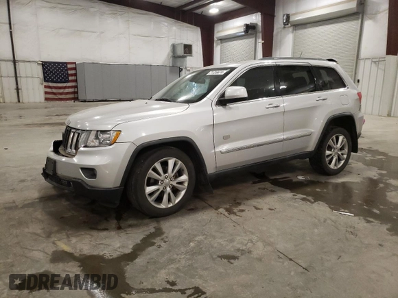 2011 Jeep Grand Cherokee 70th Anniversary with VIN 1J4RR4GG0BC666357, listed as a Copart auction lot 71726674 with 122,802 mi miles and Salvage Title. Bid and sale history available at carsss.com. Image 1.