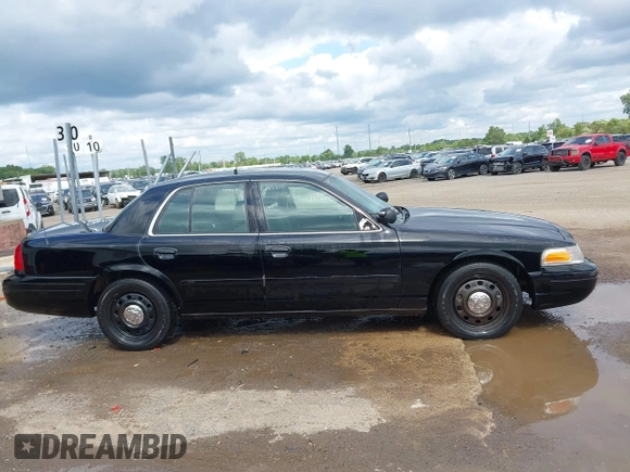2005 Ford Police Interceptor z VIN 2FAHP71WX5X154384, wystawiony jako IAAI lot #40735796 z przebiegiem 84 143 mil mil oraz . Historia ofert i sprzedaży dostępna na DreamBid. Obrazek 13.