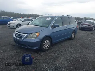 2008 Honda Odyssey EX-L with VIN 5FNRL38748B038328, listed as a IAAI auction lot 42028968 with 243,185 mi miles. Bid and sale history available at carsss.com. Image 2.