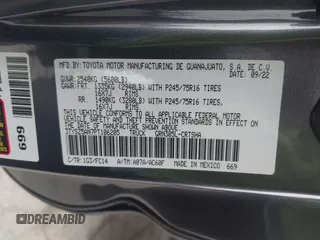 2023 Toyota Tacoma SR z VIN 3TYSZ5AN7PT106205, wystawiony jako IAAI lot #42084290 z przebiegiem 7123 mil mil oraz . Historia ofert i sprzedaży dostępna na DreamBid. Obrazek 9.