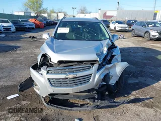 2015 Chevrolet Trax LT with VIN 3GNCJRSB6FL256031, listed as a IAAI auction lot 41995499 with 110,931 mi miles. Bid and sale history available at carsss.com. Image 12.