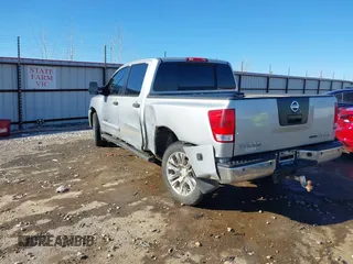 2011 Nissan Titan Pro-4X with VIN 1N6BA0EC8BN304544, listed as a IAAI auction lot 41329674 with 235,319 mi miles and . Bid and sale history available at DreamBid. Image 3.