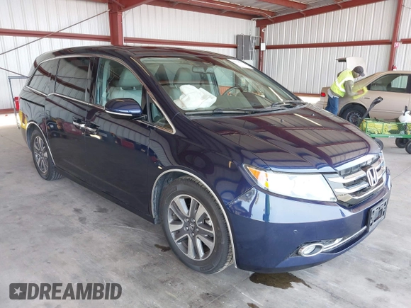 2017 Honda Odyssey Touring with VIN 5FNRL5H90HB017215, listed as a IAAI auction lot 42574528 with 61,386 mi miles and . Bid and sale history available at DreamBid. Image 1.