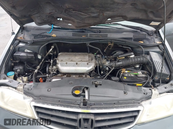 2003 Honda Odyssey EX-L with VIN 5FNRL18963B059910, listed as a IAAI auction lot 42415037 with 267,600 mi miles and . Bid and sale history available at DreamBid. Image 10.