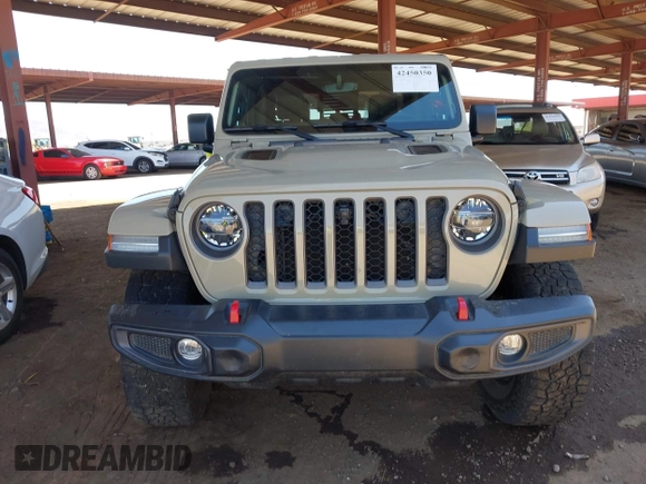 2022 Jeep Gladiator Rubicon with VIN 1C6JJTBG2NL164117, listed as a IAAI auction lot 42450350 with 22,326 mi miles and . Bid and sale history available at DreamBid. Image 12.