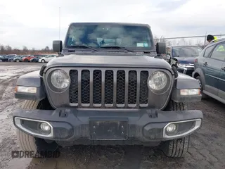 2021 Jeep Gladiator Willys with VIN 1C6HJTAGXML502037, listed as a IAAI auction lot 41225448 with 53,154 mi miles and . Bid and sale history available at carsss.com. Image 13.