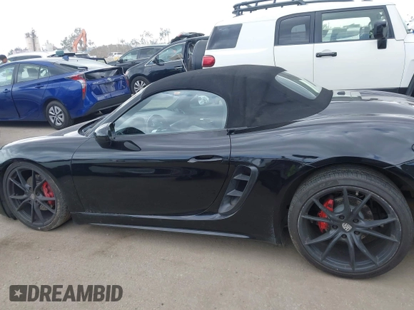 2018 Porsche 718 Boxster with VIN WP0CA2A84JS210262, listed as a IAAI auction lot 41799244 with 62,492 mi miles and . Bid and sale history available at DreamBid. Image 14.