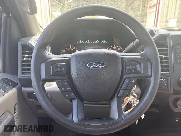 2019 Ford F-150 XL with VIN 1FTMF1EB1KKE10510, listed as a IAAI auction lot 42726982 with 98,336 mi miles and . Bid and sale history available at DreamBid. Image 7.