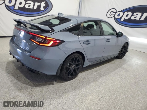 2023 Honda Civic Sport z VIN 19XFL2H89PE020319, wystawiony jako Copart lot #54294065 z przebiegiem 11 192 mil mil oraz Czysty tytuł • Clean title. Historia ofert i sprzedaży dostępna na DreamBid. Obrazek 3.