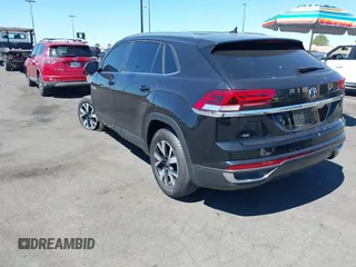 2023 Volkswagen Atlas SE z VIN 1V2DC2CA0PC206192, wystawiony jako IAAI lot #41856061 z przebiegiem 23 572 mil mil oraz . Historia ofert i sprzedaży dostępna na DreamBid. Obrazek 3.