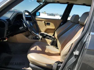1987 BMW 3 Series 325i with VIN WBAAD2309H2446547, listed as a Copart auction lot 70882344 with 187,806 mi miles and Salvage Title. Bid and sale history available at carsss.com. Image 7.