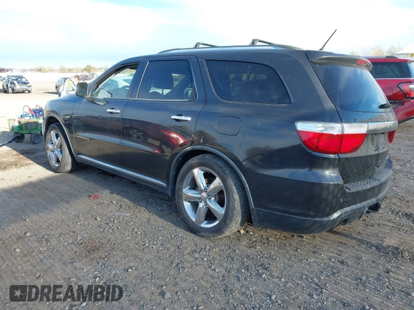 2011 Dodge Durango Citadel with VIN 1D4SE5GT3BC613998, listed as a IAAI auction lot 40760507 with 172,968 mi miles. Bid and sale history available at carsss.com. Image 3.