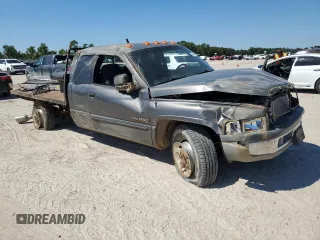 2002 Dodge Ram 2500 with VIN 3B7KC23C52M271394, listed as a Copart auction lot 73596554 with 0 mi miles and Salvage Title. Bid and sale history available at carsss.com. Image 4.