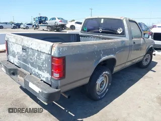 1992 Dodge Dakota S with VIN 1B7FL26X5NS691362, listed as a IAAI auction lot 42001454 with 161,181 mi miles and . Bid and sale history available at carsss.com. Image 4.