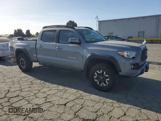 2020 Toyota Tacoma SR5 with VIN 3TMDZ5BN9LM096645, listed as a Copart auction lot 53723995 with 43,539 mi miles and Salvage title. Bid and sale history available at DreamBid. Image 4.