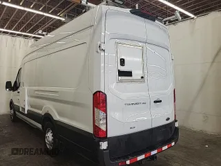 2023 Ford Transit Cargo z VIN 1FTBW3U84PKB20116, wystawiony jako IAAI lot #42782997 z przebiegiem 6 591 mil mil oraz . Historia ofert i sprzedaży dostępna na DreamBid. Obrazek 7.