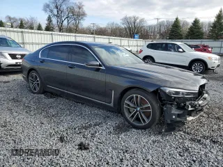 2020 BMW 7 Series 750i xDrive with VIN WBA7U2C01LGM27402, listed as a Copart auction lot 52943595 with Not provided miles and Salvage title. Bid and sale history available at DreamBid. Image 4.