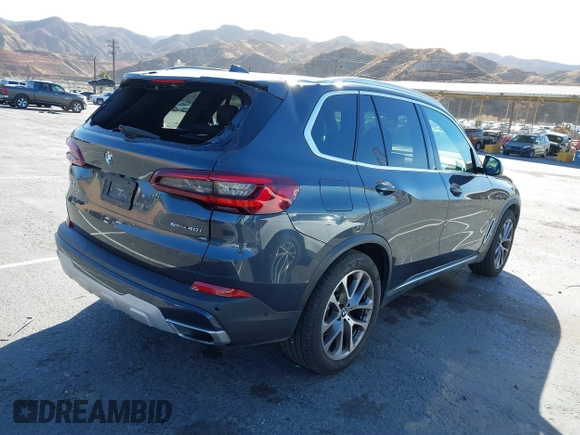 2021 BMW X5 sDrive40i with VIN 5UXCR4C00M9F94906, listed as a IAAI auction lot 41359872 with 37,161 mi miles. Bid and sale history available at carsss.com. Image 4.